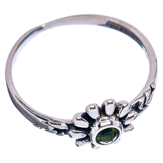 Sterling silver peridot flower ring, green round stone on sculpted band