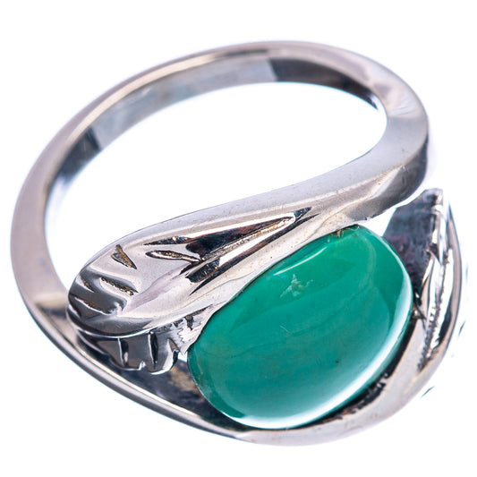 Size 7 turquoise oval ring in .925 sterling silver, engraved shoulders, side view.