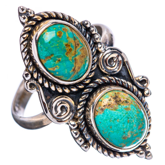 Sterling silver adjustable ring with oval turquoise cabochons and ornate spiral details
