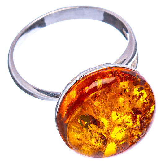 Adjustable oval amber ring with glossy honey amber cabochon and .925 sterling silver band