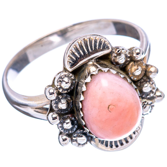 Pink opal sterling silver ring with oval pink stone and textured sunburst sides
