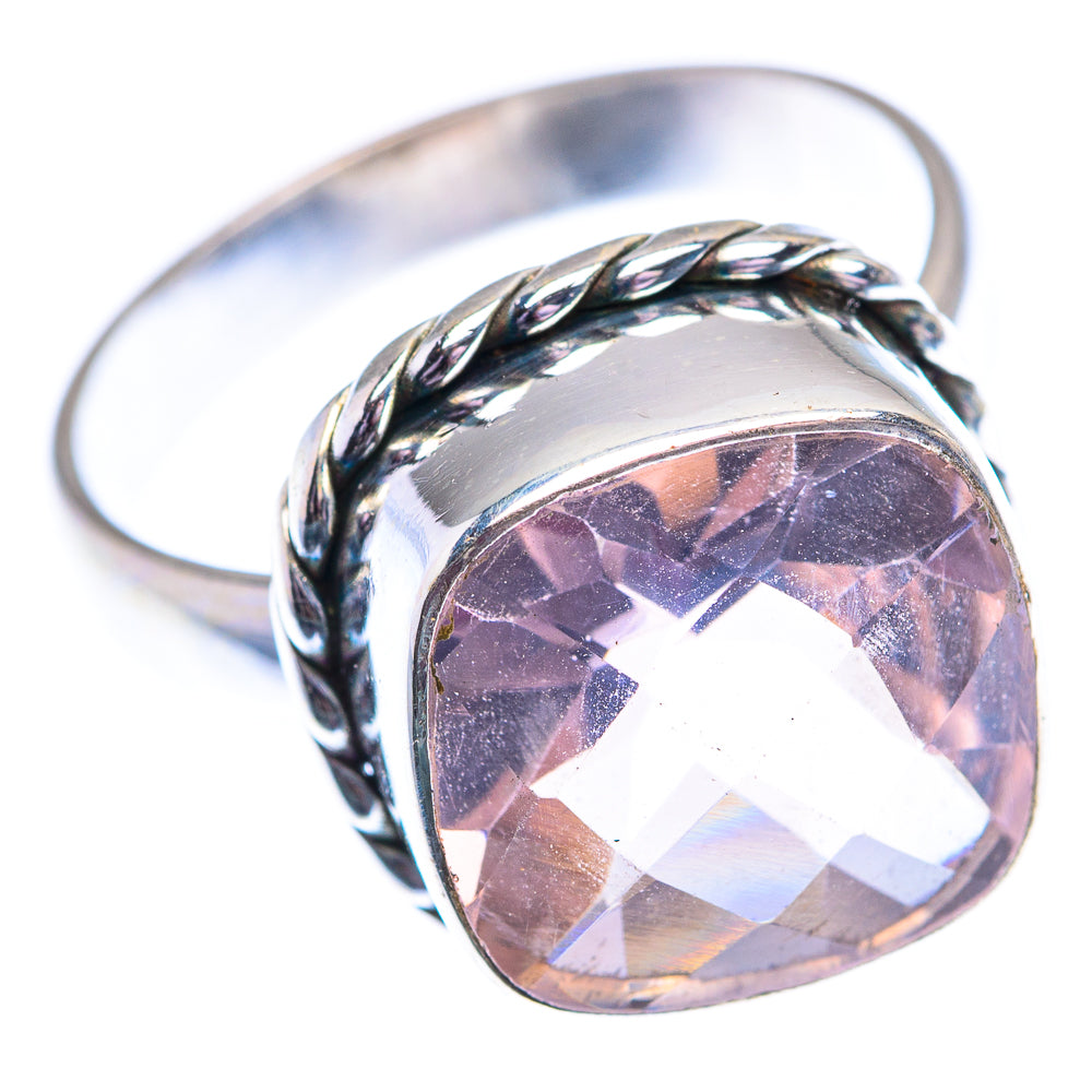 Sterling silver ring with faceted oval pink gemstone set in twisted rope mount