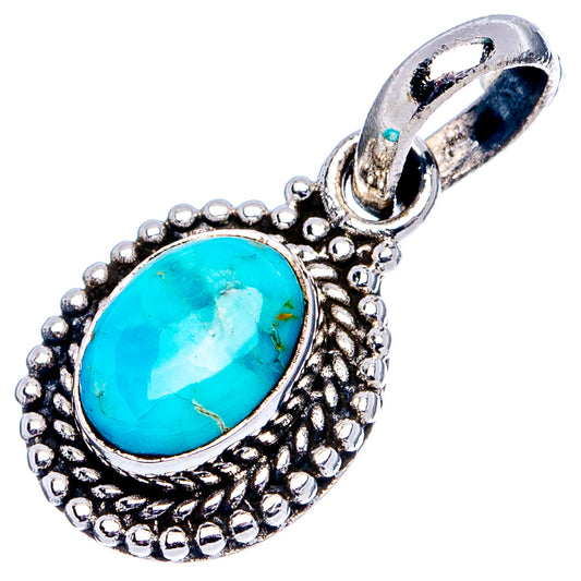 Oval turquoise cabochon pendant in .925 sterling silver with textured bead edge and bail
