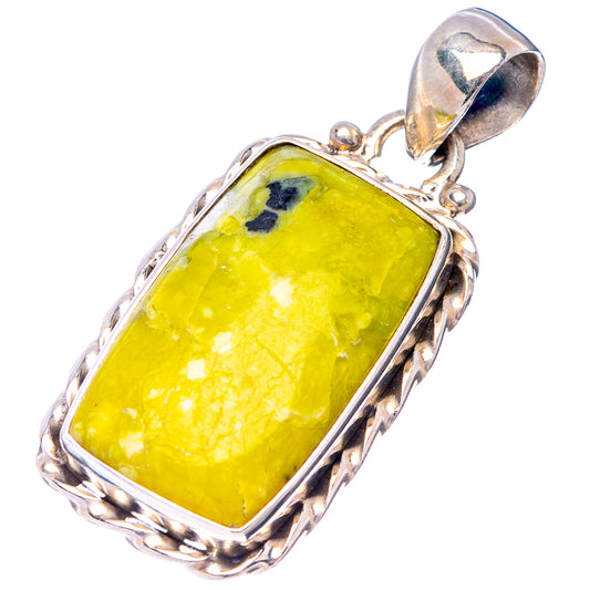 Lizardite gemstone pendant in sterling silver setting, yellow rectangle with scalloped frame and loop.