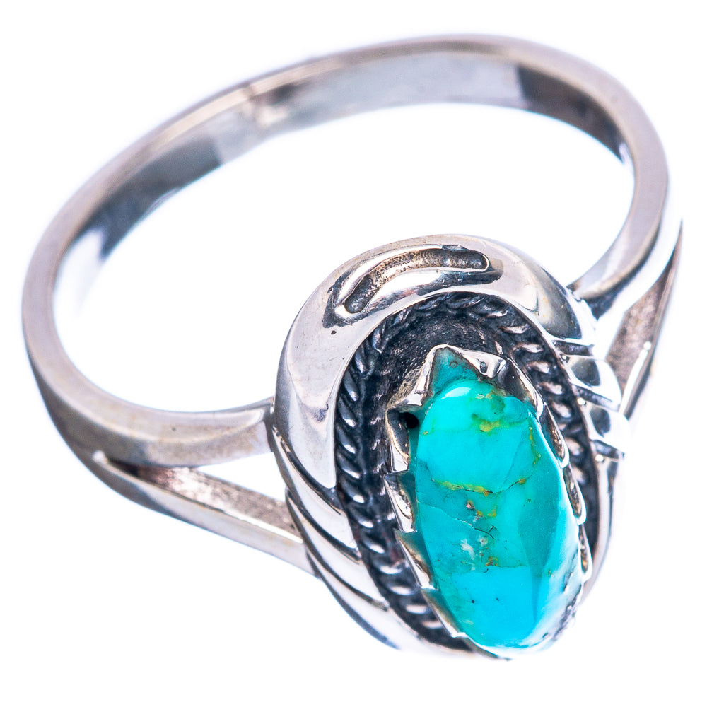 Sterling silver ring with turquoise oval stone in detailed filigree bezel, size 7.5