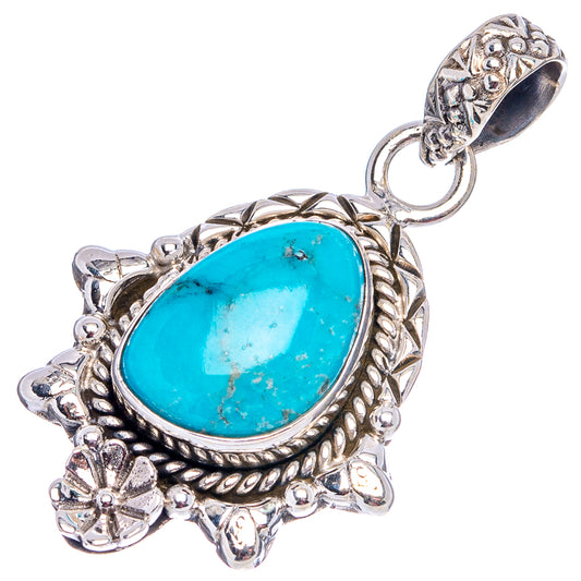 Oval turquoise cabochon pendant in .925 sterling silver with loop bail and floral accents