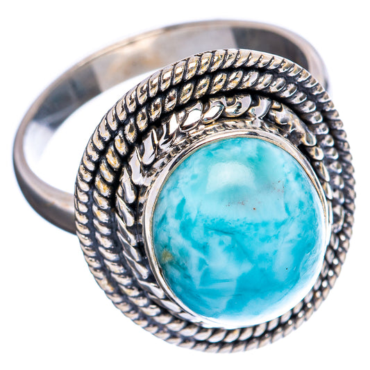 Sterling silver larimar ring with textured rope edge and oval light blue cabochon