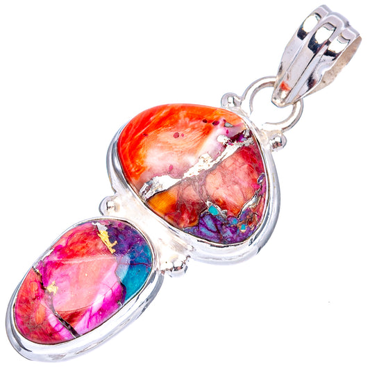 Sterling silver pendant featuring two oval cabochon stones with turquoise accents