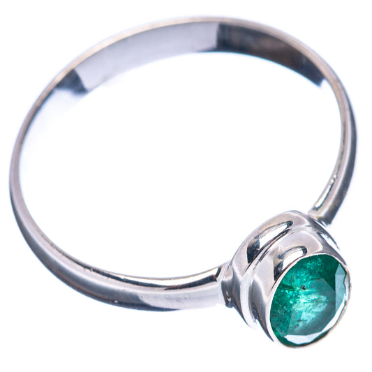 Sterling silver ring with oval green emerald, open side view