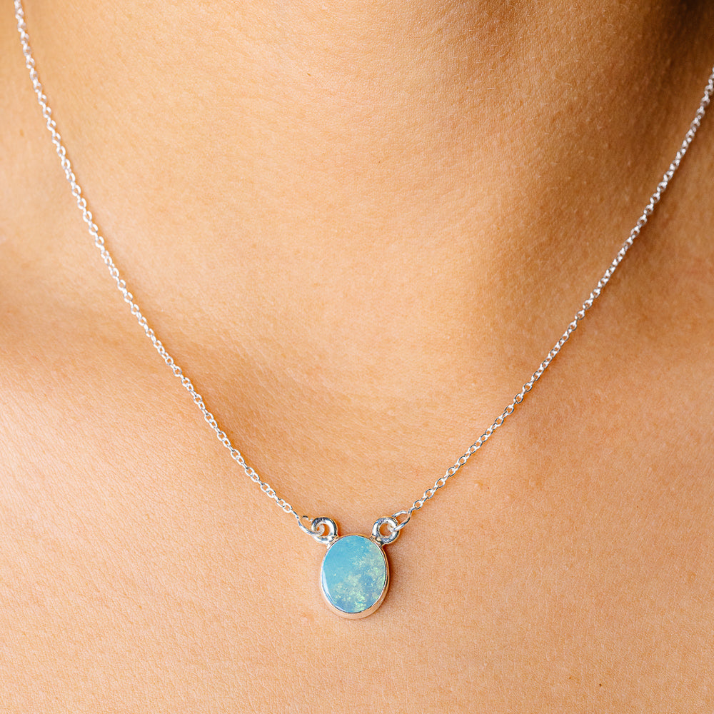 Sterling silver opal pendant necklace with oval blue opal and link chain
