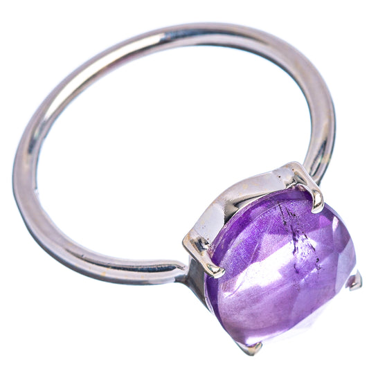 Silver ring with purple oval amethyst and three prongs, side view