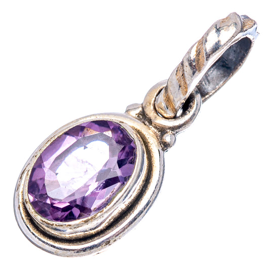 Oval amethyst sterling silver pendant with raised bezel and loop bail