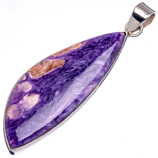 Teardrop charoite pendant with purple and light streaks, framed in sterling silver