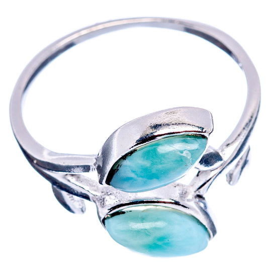 Larimar leaf sterling silver ring with two raised teal oval stones on leaf-style band