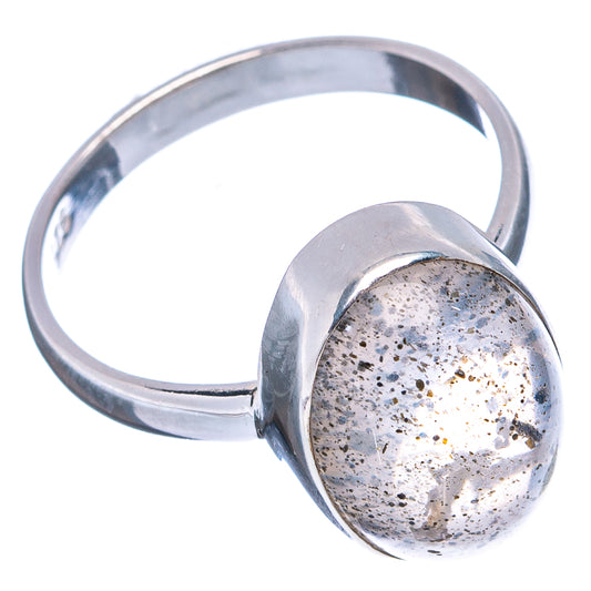 Sterling silver rutilated quartz ring with oval cabochon and dark speckled pattern