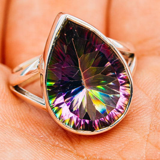 Sterling silver teardrop gemstone ring in side view, faceted rainbow mystic topaz