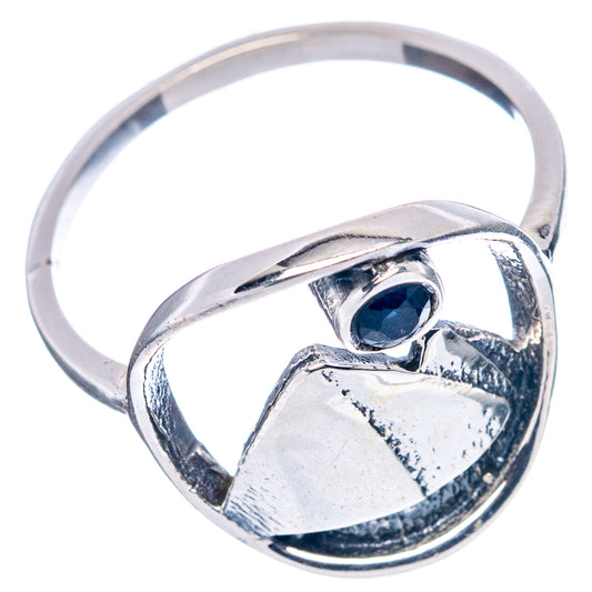 Sterling silver ring featuring blue quartz bezel and openwork band detail