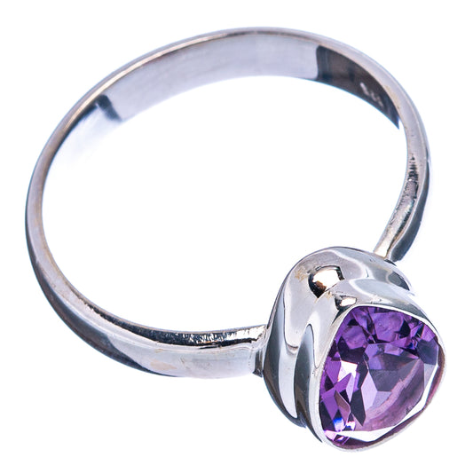 Sterling silver amethyst ring with oval faceted purple stone, side view