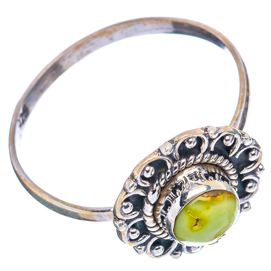 Sterling silver dainty ring with circular yellow cabochon and filigree-style openwork setting