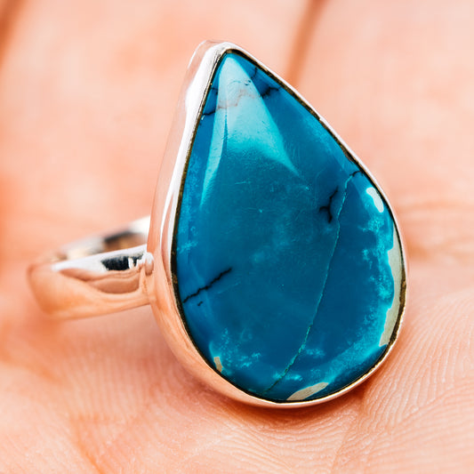 Sterling silver turquoise ring with teardrop blue cabochon in oval bezel