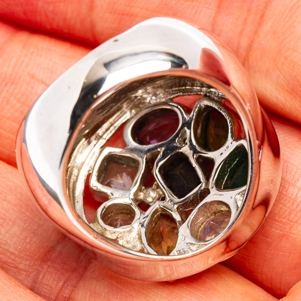 Sterling silver ring underside with assorted colored gemstone settings, open gallery prongs