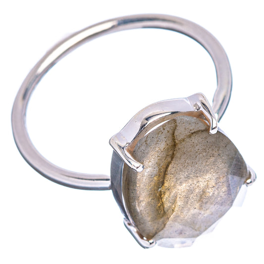 Sterling silver band and oval faceted labradorite ring with bezel prongs, dark stone