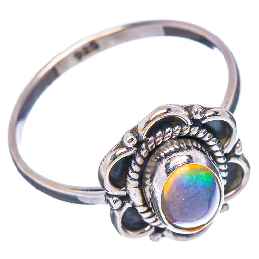 Sterling silver opal ring with oval rainbow gemstone, ornate round bezel