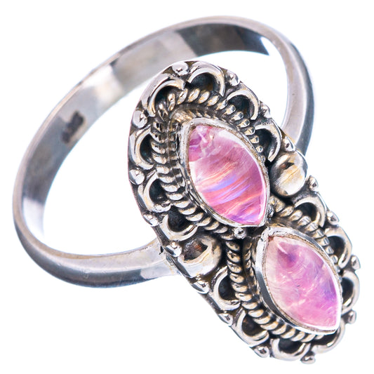 Sterling silver ring with two pink oval cabochon moonstones, decorative filigree setting