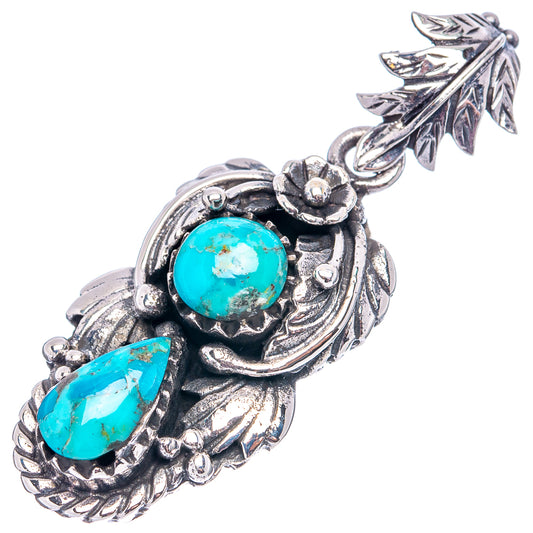 Sterling silver turquoise pendant with two blue cabochon stones and ornate leaf border