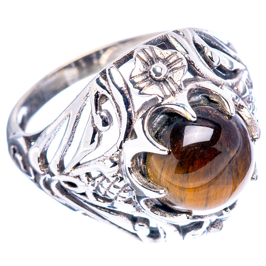 Tiger's eye sterling silver filigree ring with ornate band scrollwork and oval stone