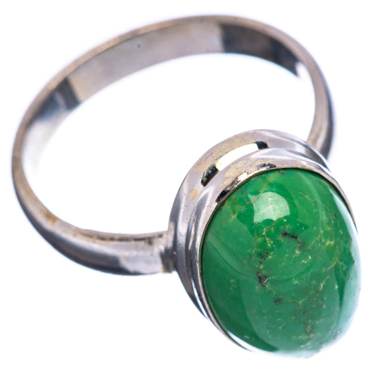 Sterling silver ring with oval green gemstone, side view