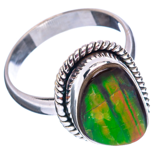 Sterling silver oval ammolite ring with green iridescent stone and rope-style silver band