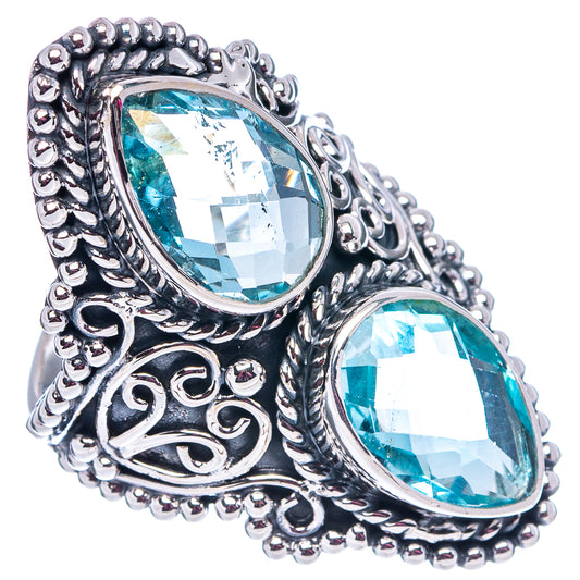 Oval blue topaz double-stone sterling silver ring with detailed filigree border