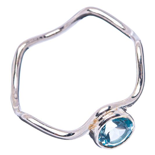 Sterling silver open-frame ring with oval blue topaz gemstone on band end