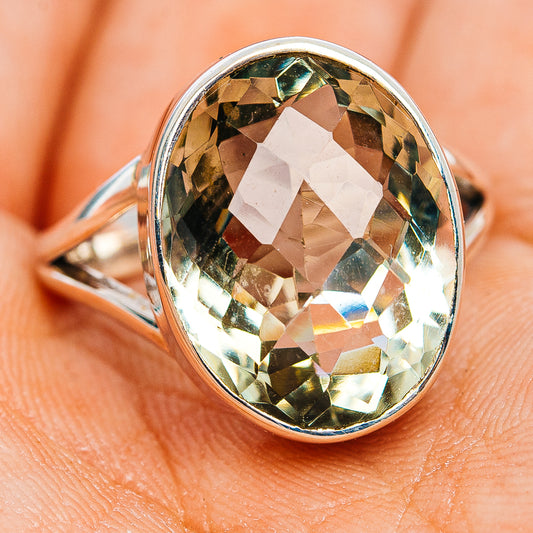 Oval green faceted amethyst ring in .925 sterling silver, on hand