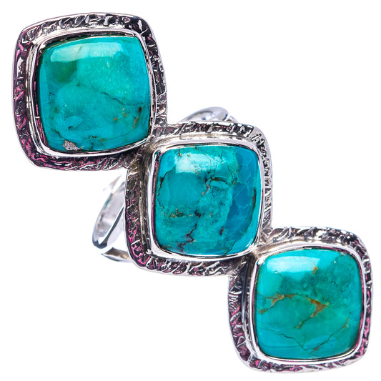 Sterling silver three-stone turquoise ring with oval bezels, size 8.