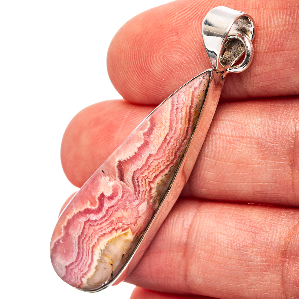 Rhodochrosite teardrop pendant in .925 sterling silver with pink banded stone bezel