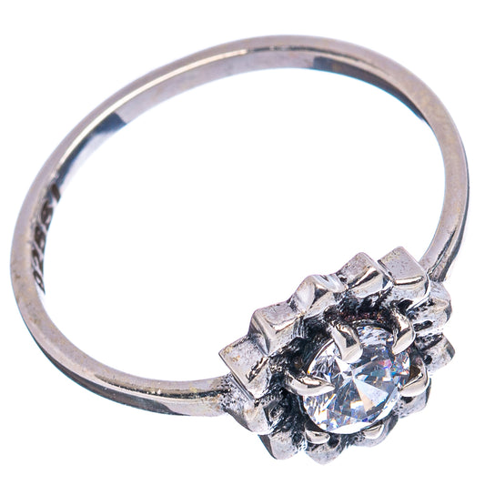 Sterling silver ring with round cubic zirconia center and scalloped prongs