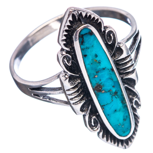 Turquoise oval sterling silver ring with engraved settings and split-shank band