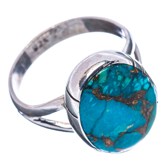 Sterling silver turquoise ring with oval bezel and dark copper veining