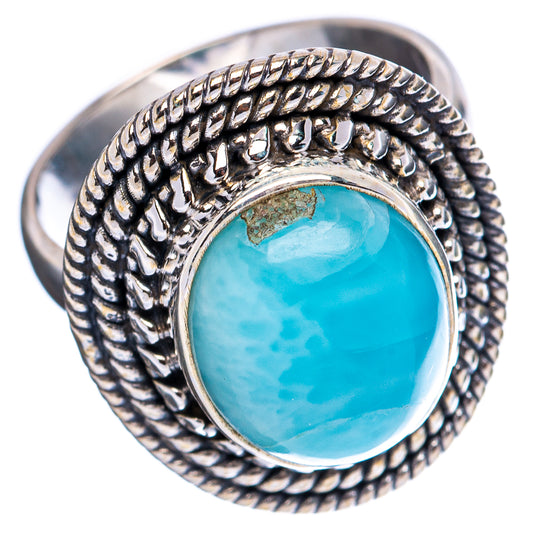 Larimar .925 sterling silver ring, oval light-blue cabochon in braided frame, side view