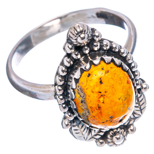 Sterling silver oval yellow jasper cabochon ring with braided bead border and leaf accents
