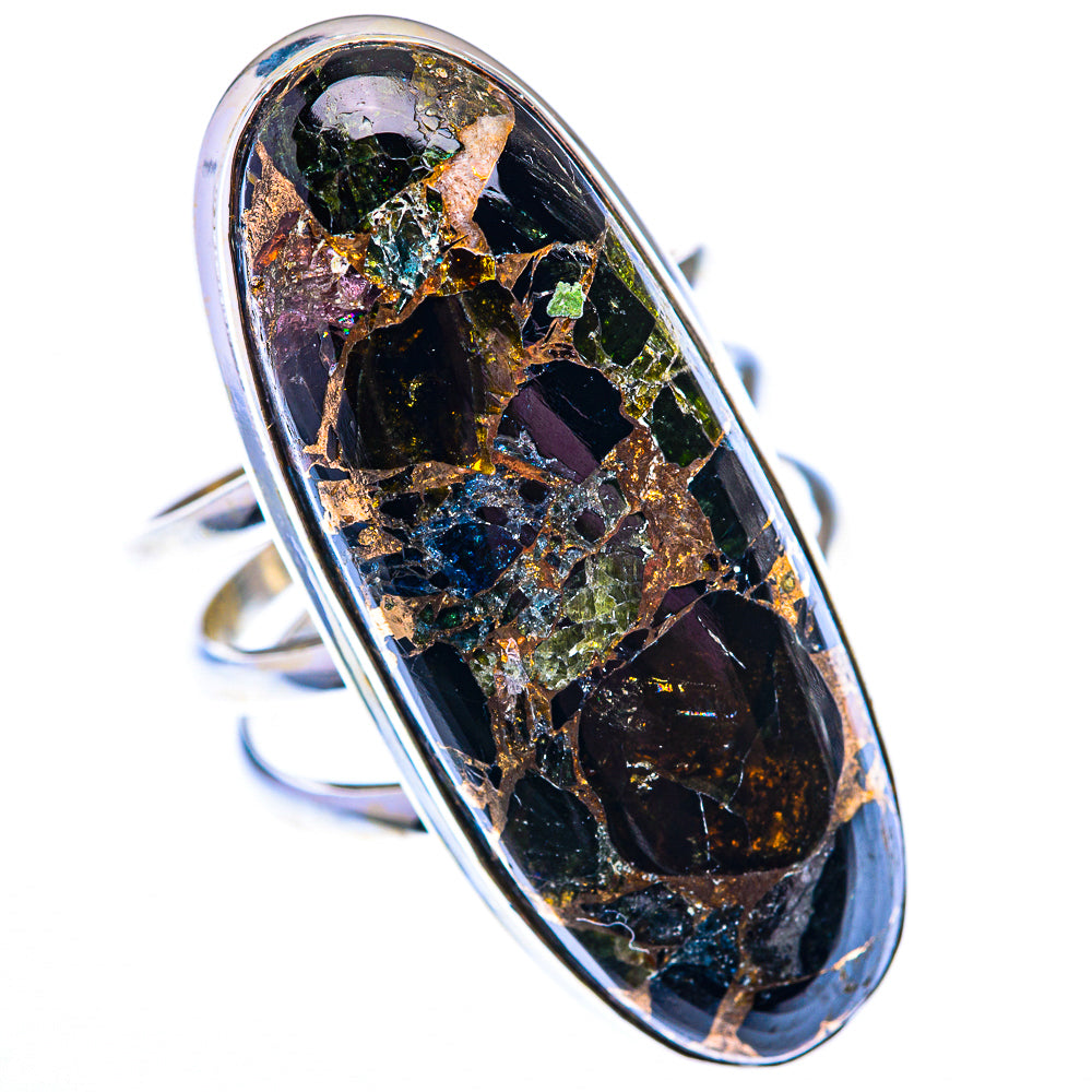 Oval black onyx ring with iridescent multicolor inclusions and silver band