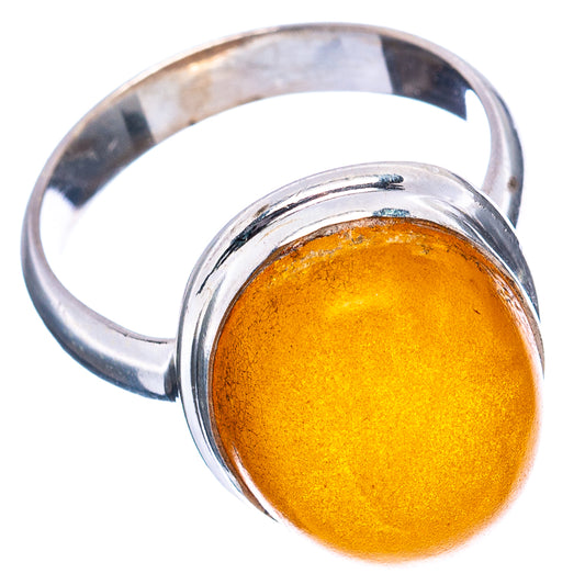 Sterling silver ring with amber cabochon, side view on band