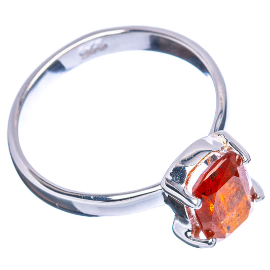 Orange kyanite ring featuring an orange faceted gemstone in .925 sterling silver prong setting