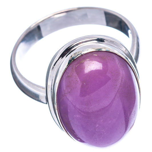 Purple oval gemstone set in .925 sterling silver ring band, size 7.75