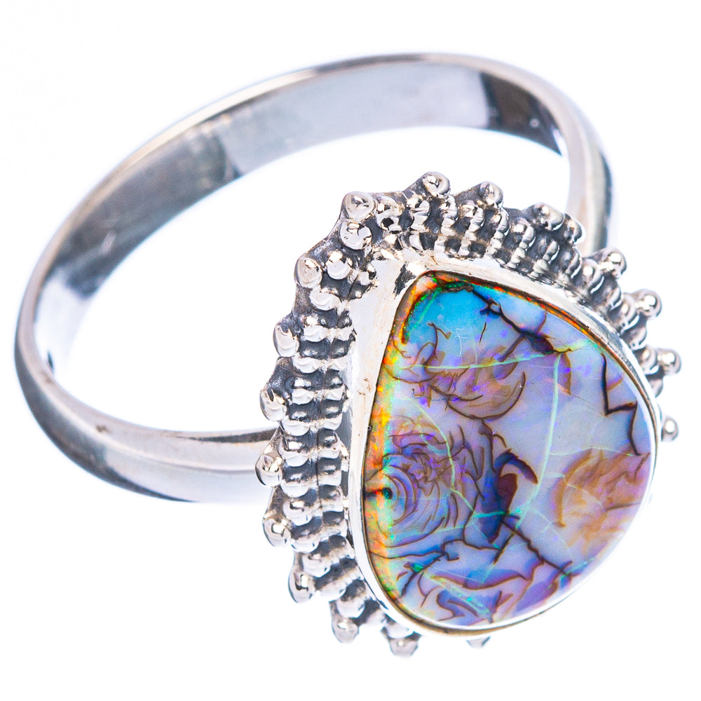 Sterling silver opal ring with oval cabochon stone and raised beaded setting