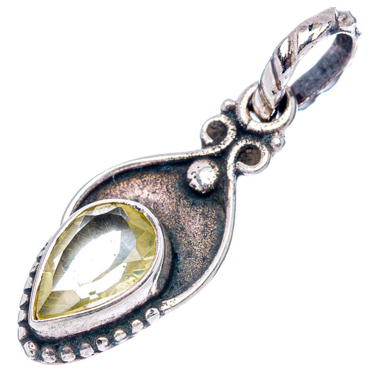 Sterling silver citrine teardrop pendant with ornate bezel and hanging loop