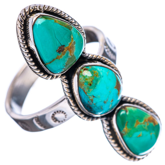 Turquoise oval center stone and two side stones on adjustable .925 sterling silver band