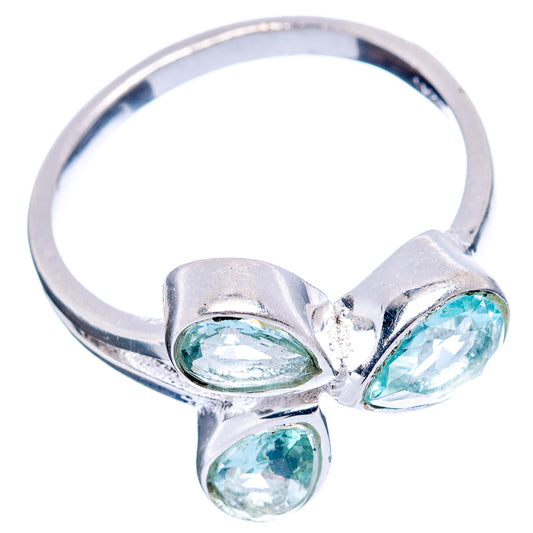Sterling silver ring with three blue topaz pear shapes on a curved band, size 7.75